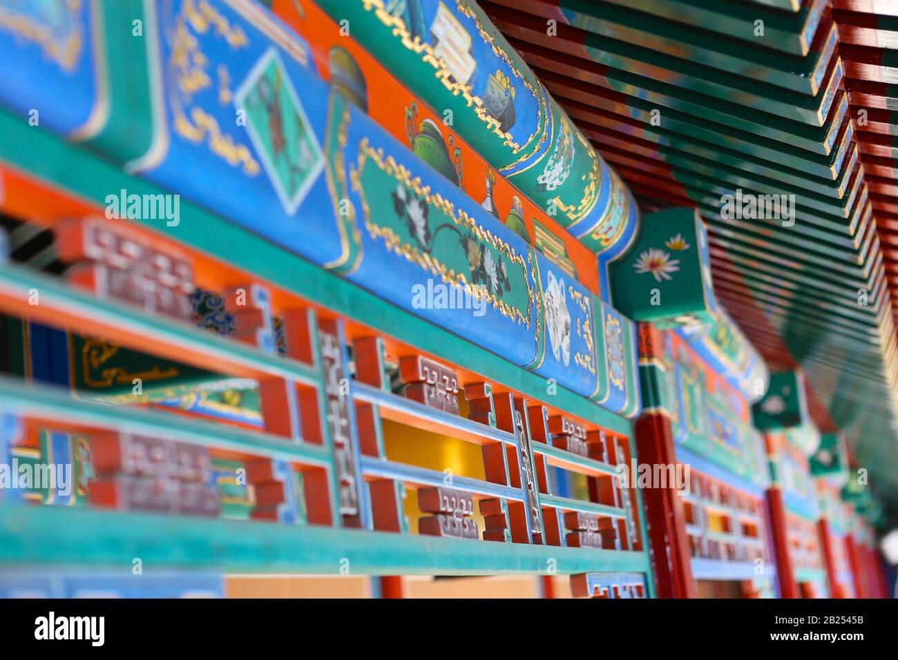 Traditional figures and shape on painted Chinese roof. Chinese ancient architecture. Beijing Stock Photo