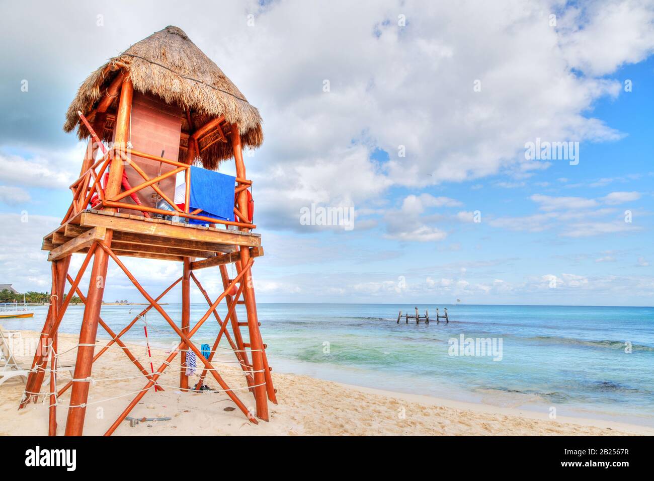 Lifeguard tower on the tropical beaches of Riviera Maya near Cancun, Mexico. Concept of Summer vacation or Winter getaway to the Caribbean Sea. Stock Photo