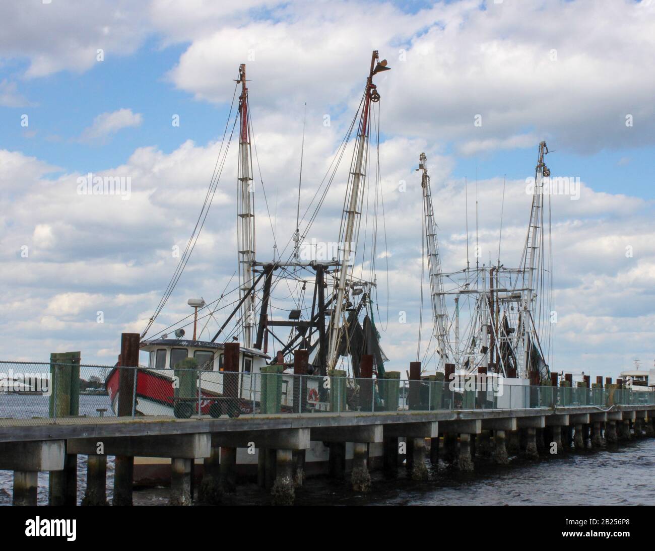 Shrimp Boats docked on the St. Johns River at Mayport Village, Florida Stock Photo