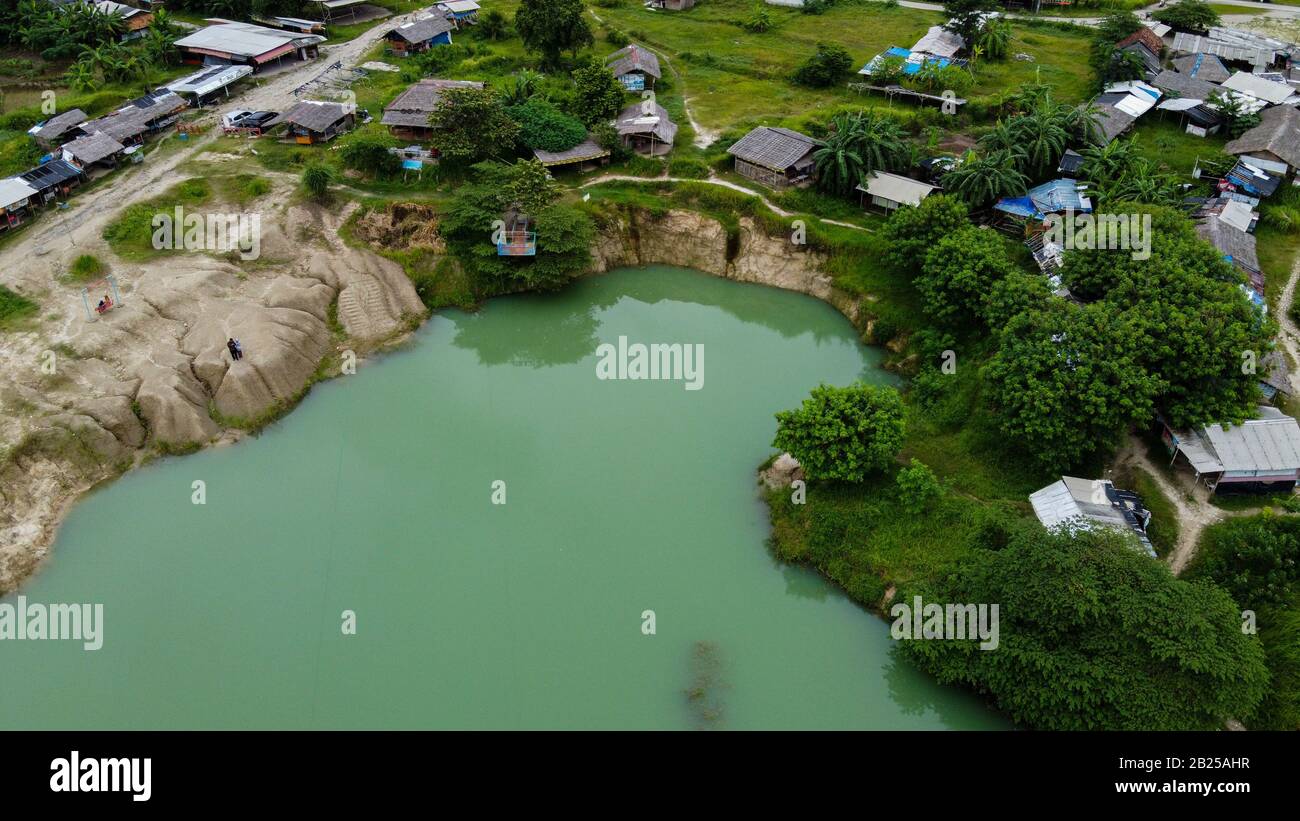 Aerial view beautiful green lake and surrounded by green grass Stock ...