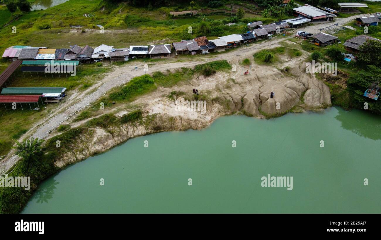 Aerial view beautiful green lake and surrounded by green grass Stock ...