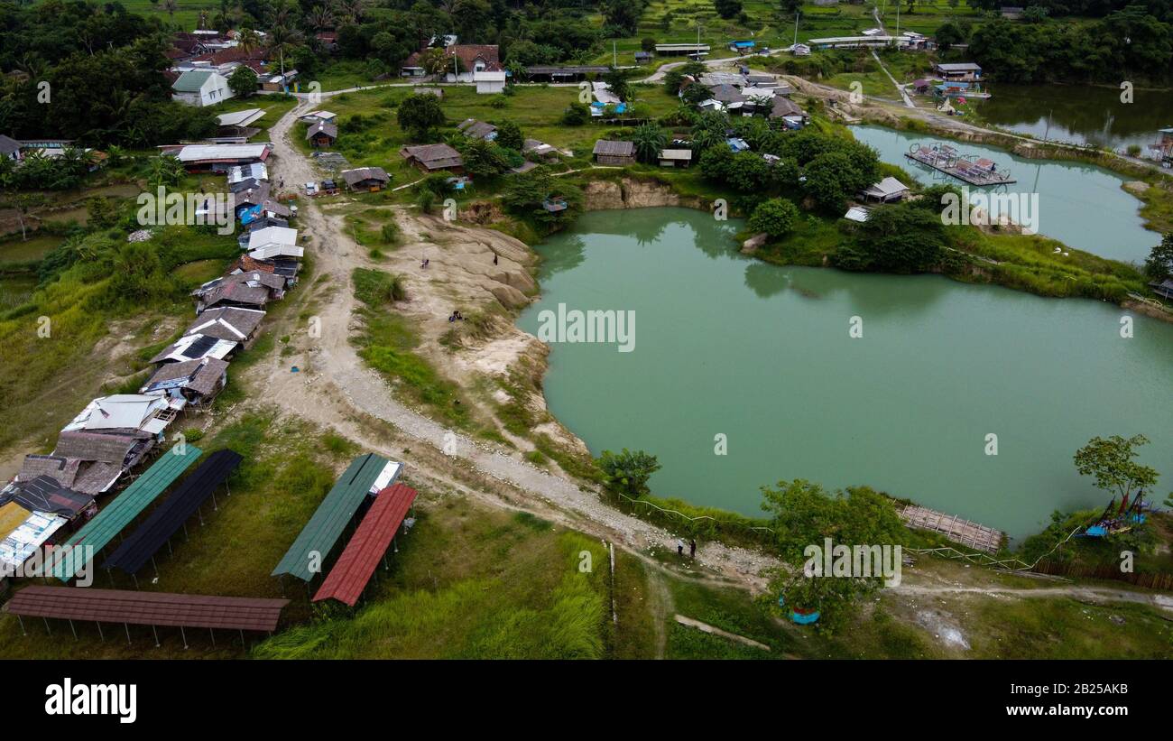 Aerial view beautiful green lake and surrounded by green grass Stock ...
