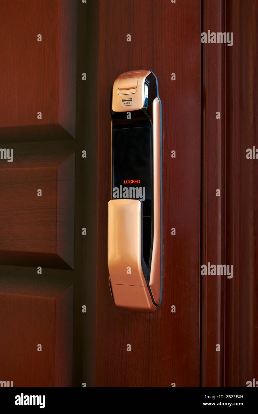 Close-up of a smart door lock showing locked Stock Photo