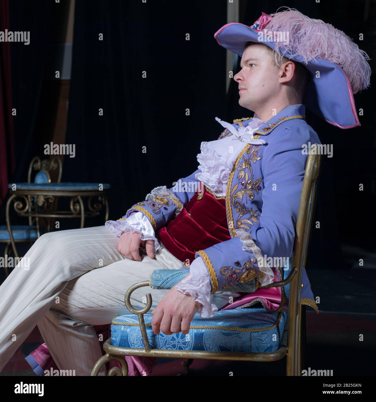 Actor dressed historical costume in interior of old theater Stock Photo ...