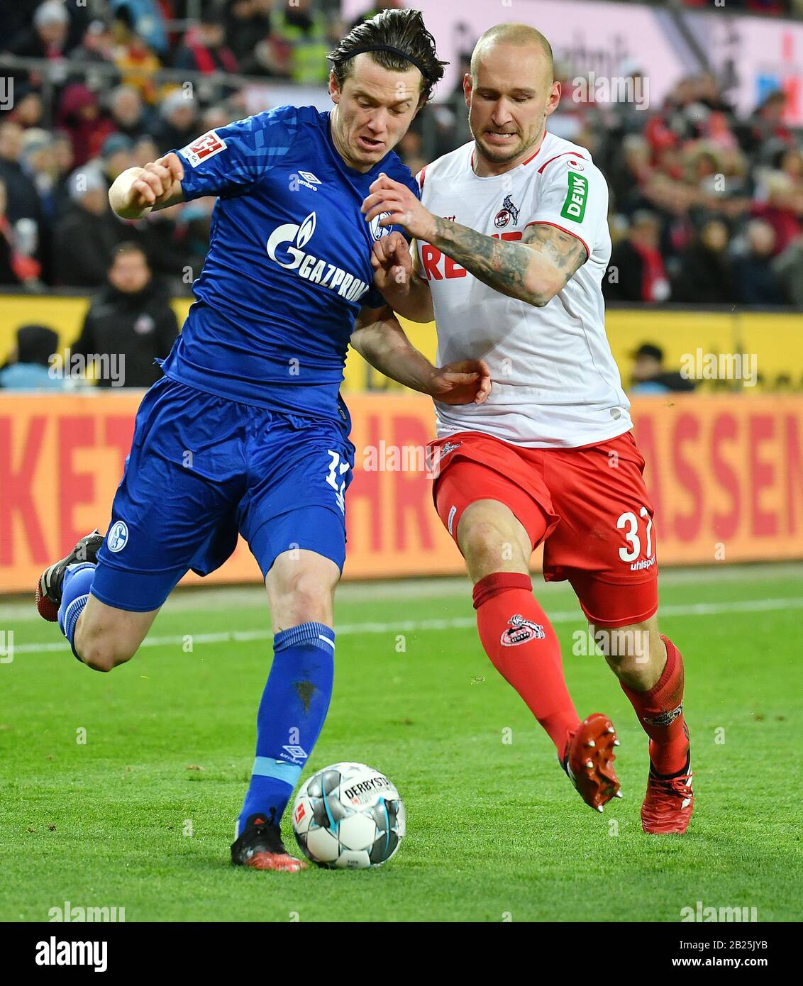Cologne Germany 29th Feb 2020 Michael Gregoritsch L Of Schalke 04 Vies With Toni Leistner Of Cologne During A German Bundesliga Match Between Fc Cologne And Fc Schalke 04 In Cologne Germany