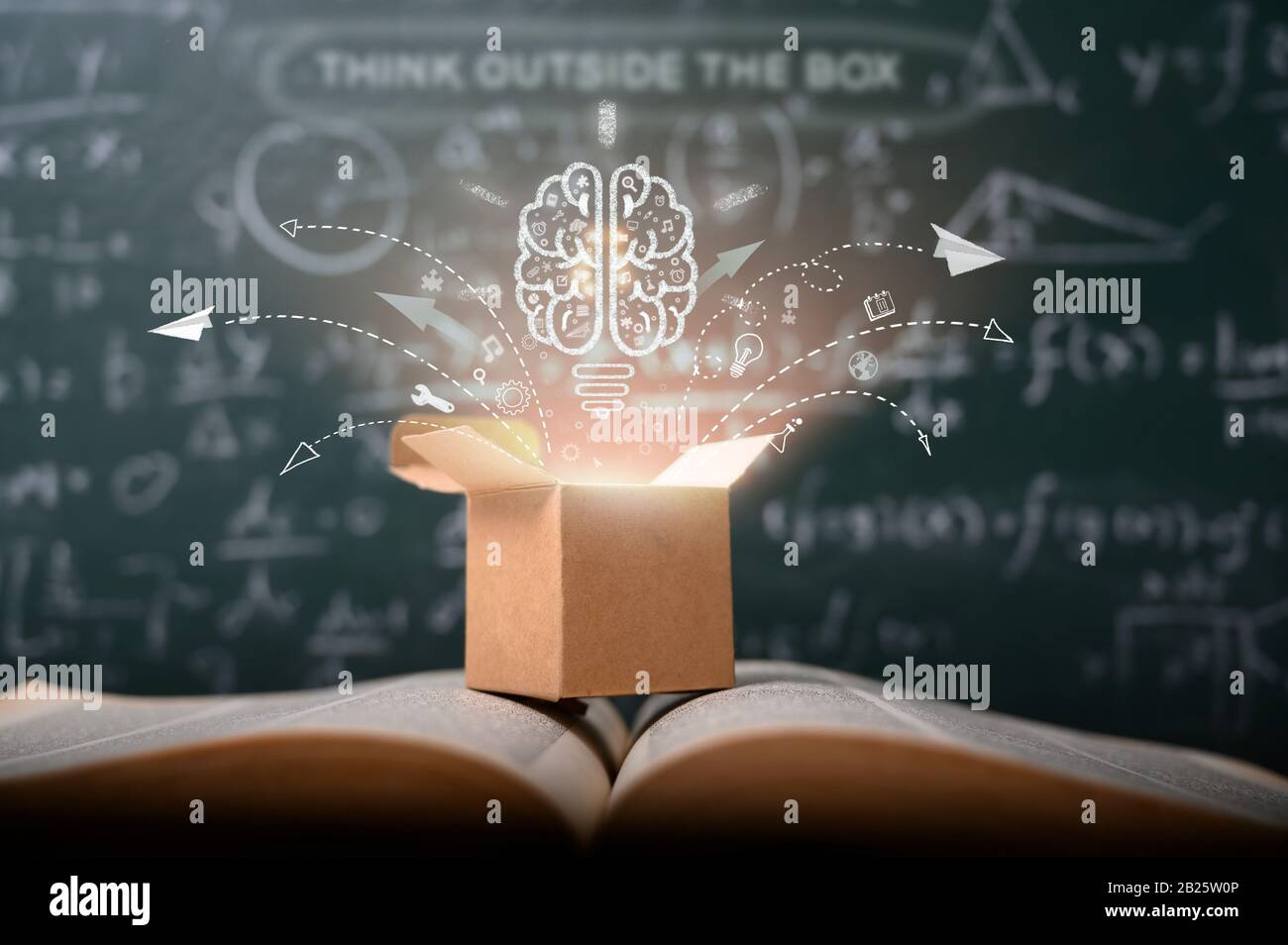 think outside the box on school green blackboard . startup education