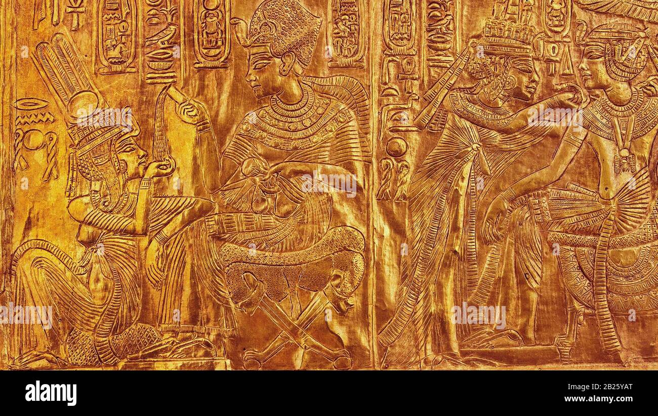 Small Reliquary in gilded wood with scenes of Tutankhamun and Ankhesenamun Stock Photo