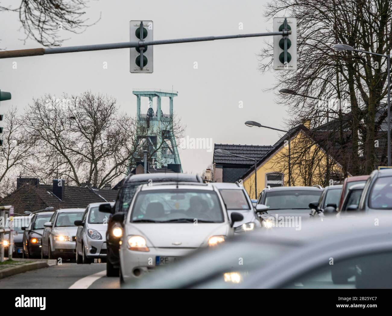Dense traffic on the Herner Stra§e, in Bochum Riemke, winding tower of the mining museum, Germany Stock Photo