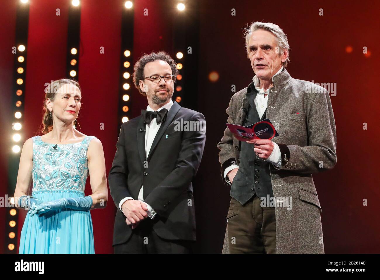 Berlin, Germany. 29th Feb, 2020. President of the International Jury Jeremy Irons (R) announces the winner of the Golden Bear for Best Film with Berlinale Executive Director Mariette Rissenbeek (L) and Berlinale Artistic Director Carlo Chatrian standing aside during the awards ceremony of 70th Berlin International Film Festival in Berlin, capital of Germany, Feb. 29, 2020. Credit: Shan Yuqi/Xinhua/Alamy Live News Stock Photo
