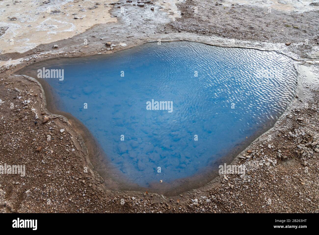 Geysir Golden Circle in Iceland milky water in thermal spring pool so