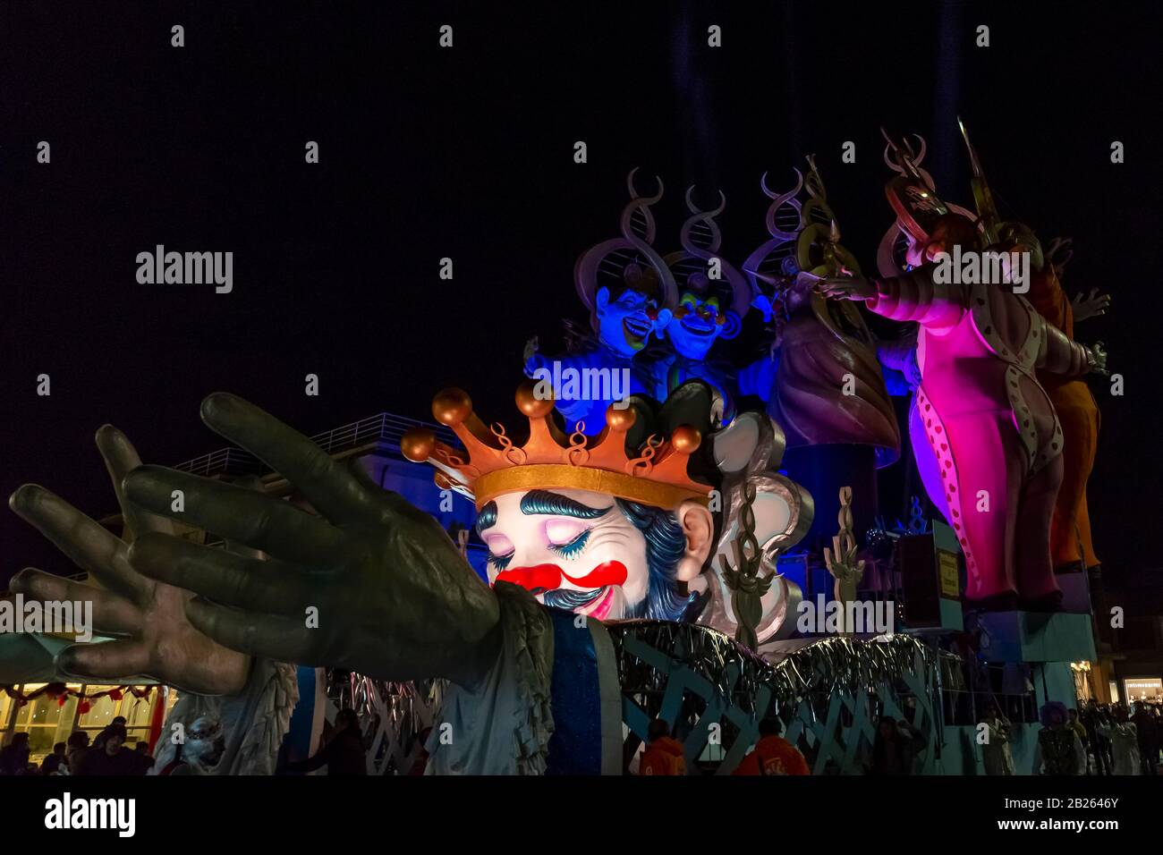 The allegorical float entitled 'Abbracciami è Carnevale' during the night parade in Viareggio, Italy Stock Photo