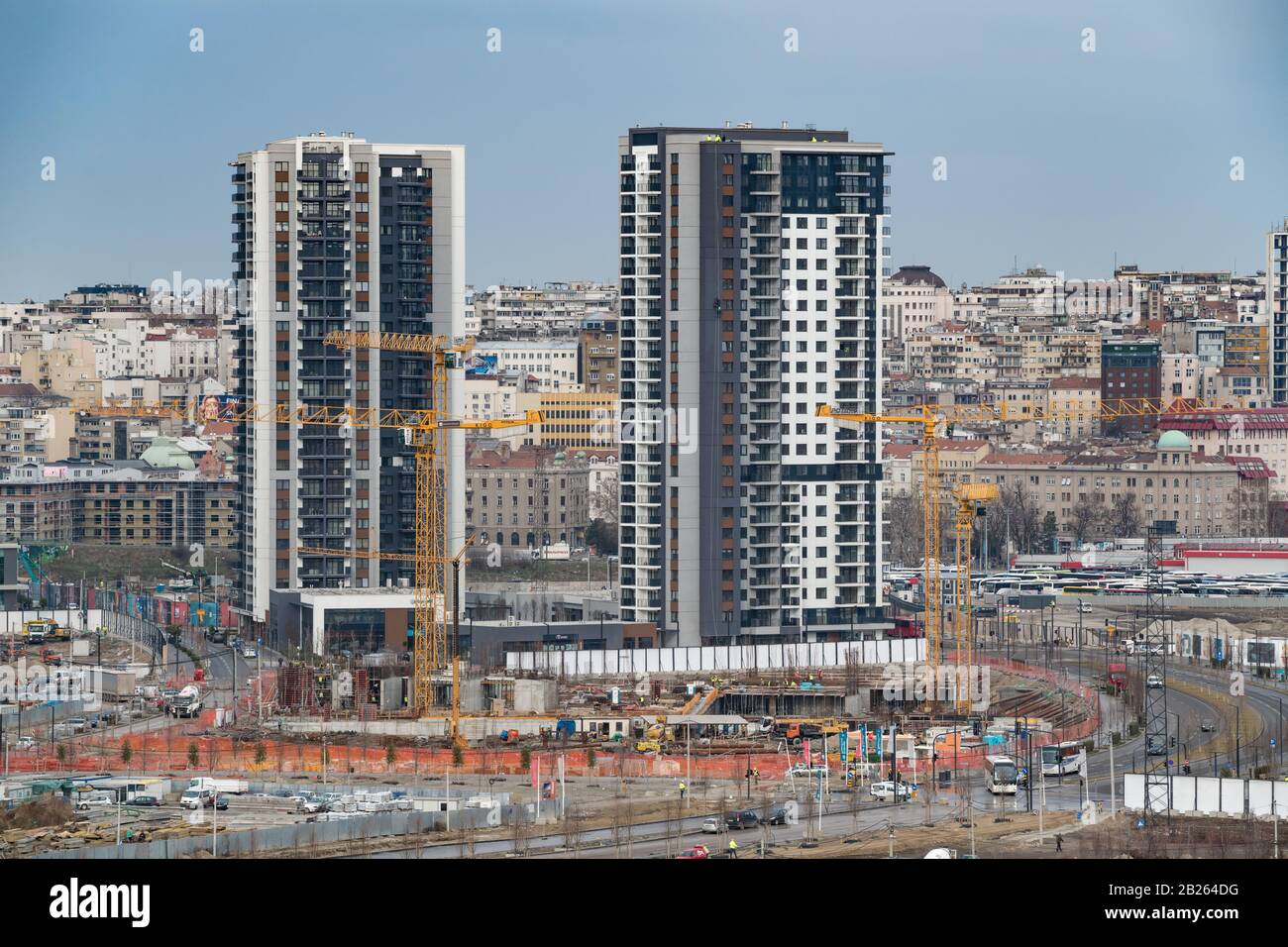 Construction of buildings on bank of the Sava river in the city center, near the gazelle (gazela) bridge. Confluence of the Sava river into the Danube Stock Photo