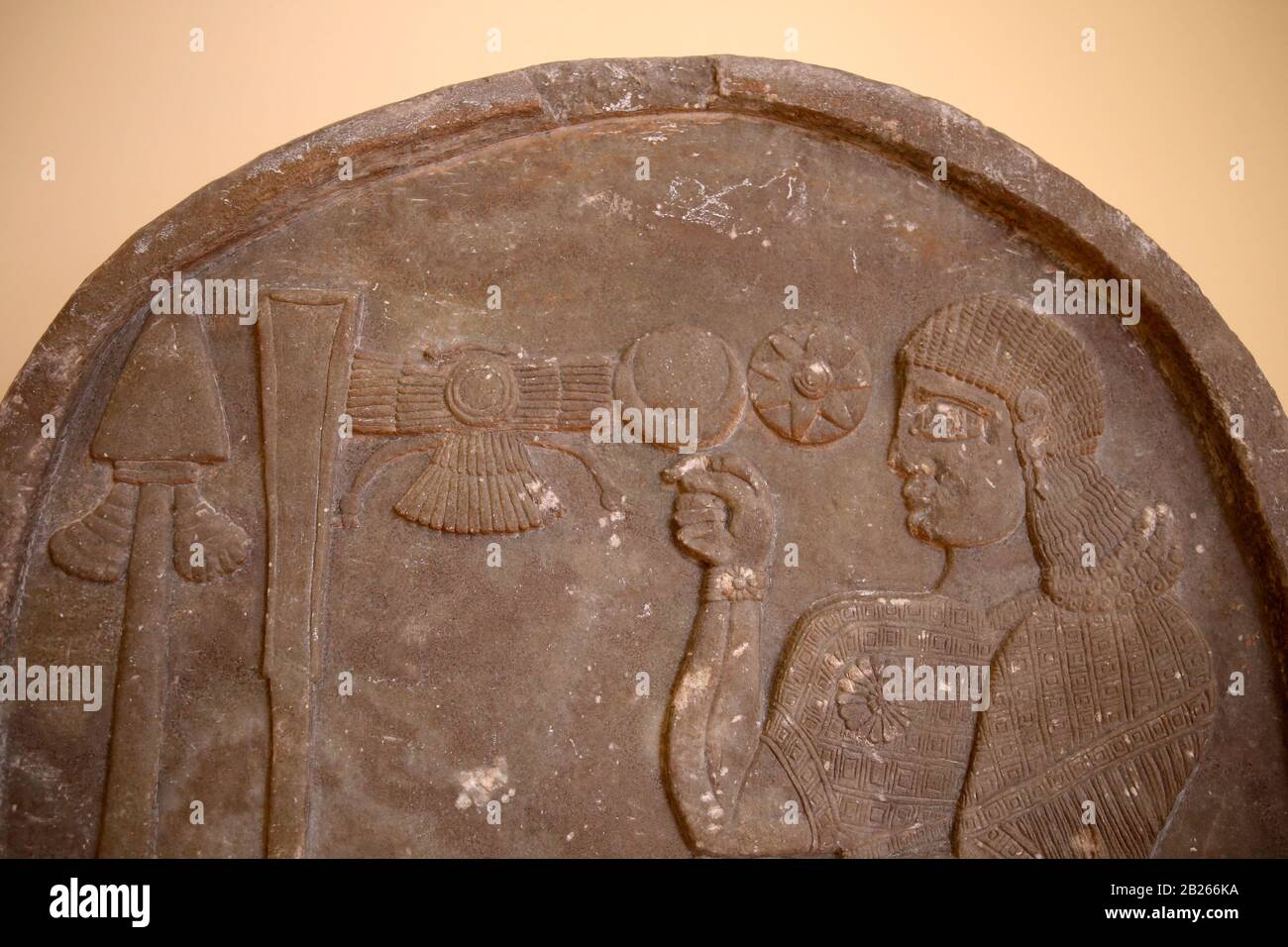 Bel-harran-beli-usur is praying in front of divine symbols. Stele with inscription and relief. 8th BCE. Limestone. Tel-Abda. Marble. Iraq. Detail. Stock Photo