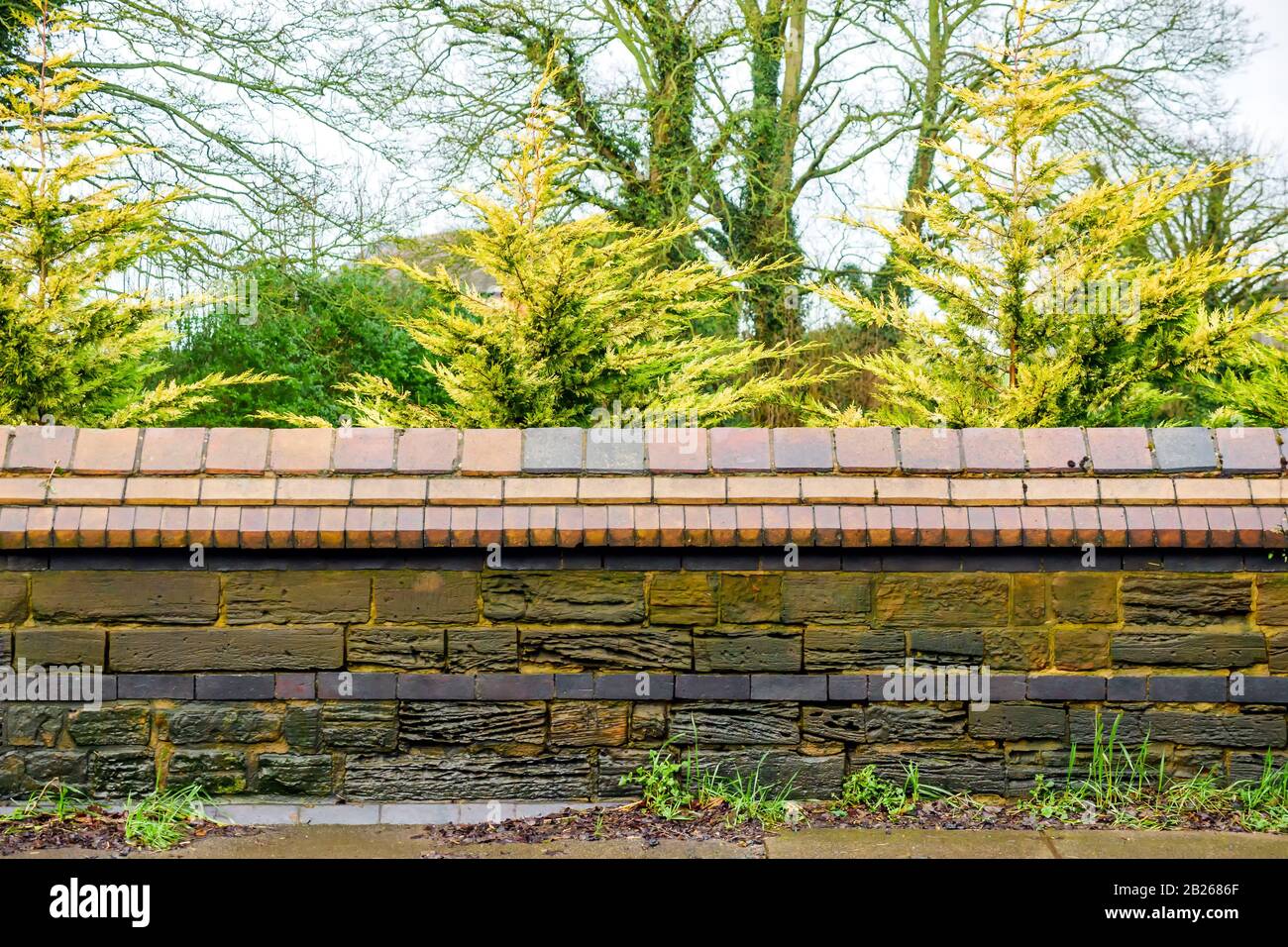 low stone wall fence over park and mansion in england uk Stock Photo ...