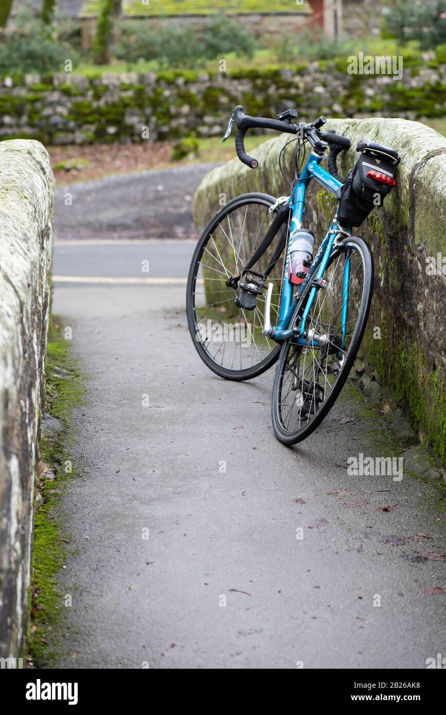 Road Bike Lent against a wall Uk Stock Photo