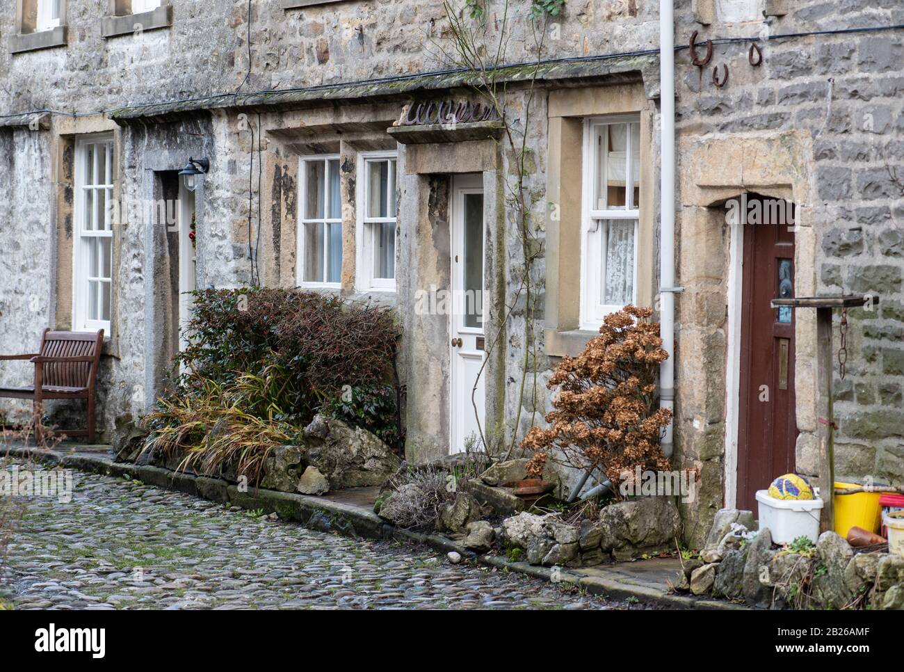 Row of cottages Grassington North Yorkshire Dales UK Stone Terrace Houses Village Stock Photo