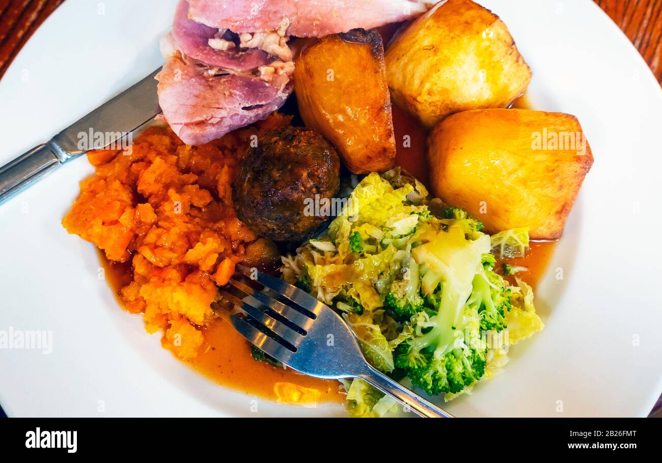 Roast ham with vegetables Stock Photo Alamy