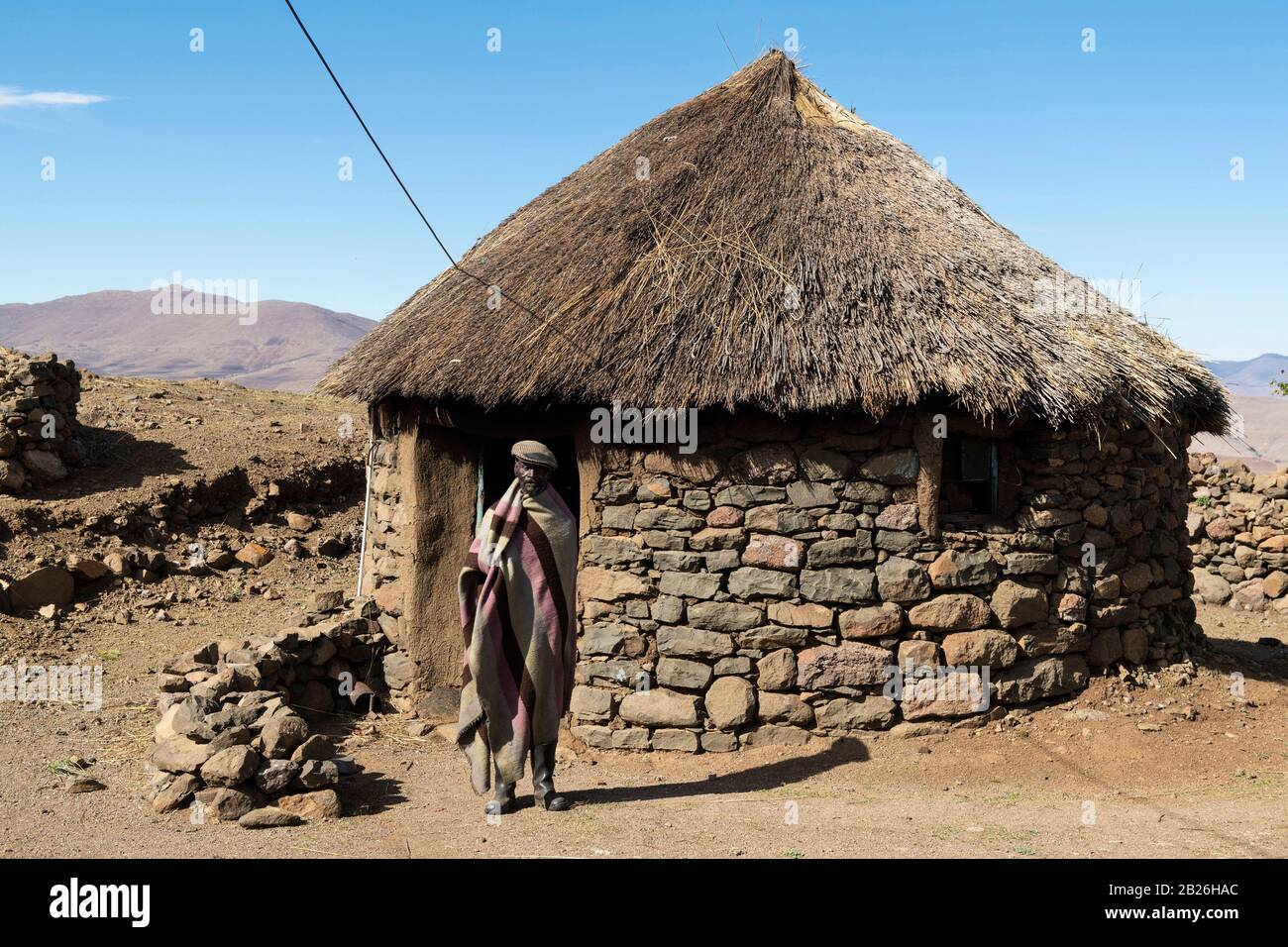 Basotho man at his hut, Lesotho Stock Photo