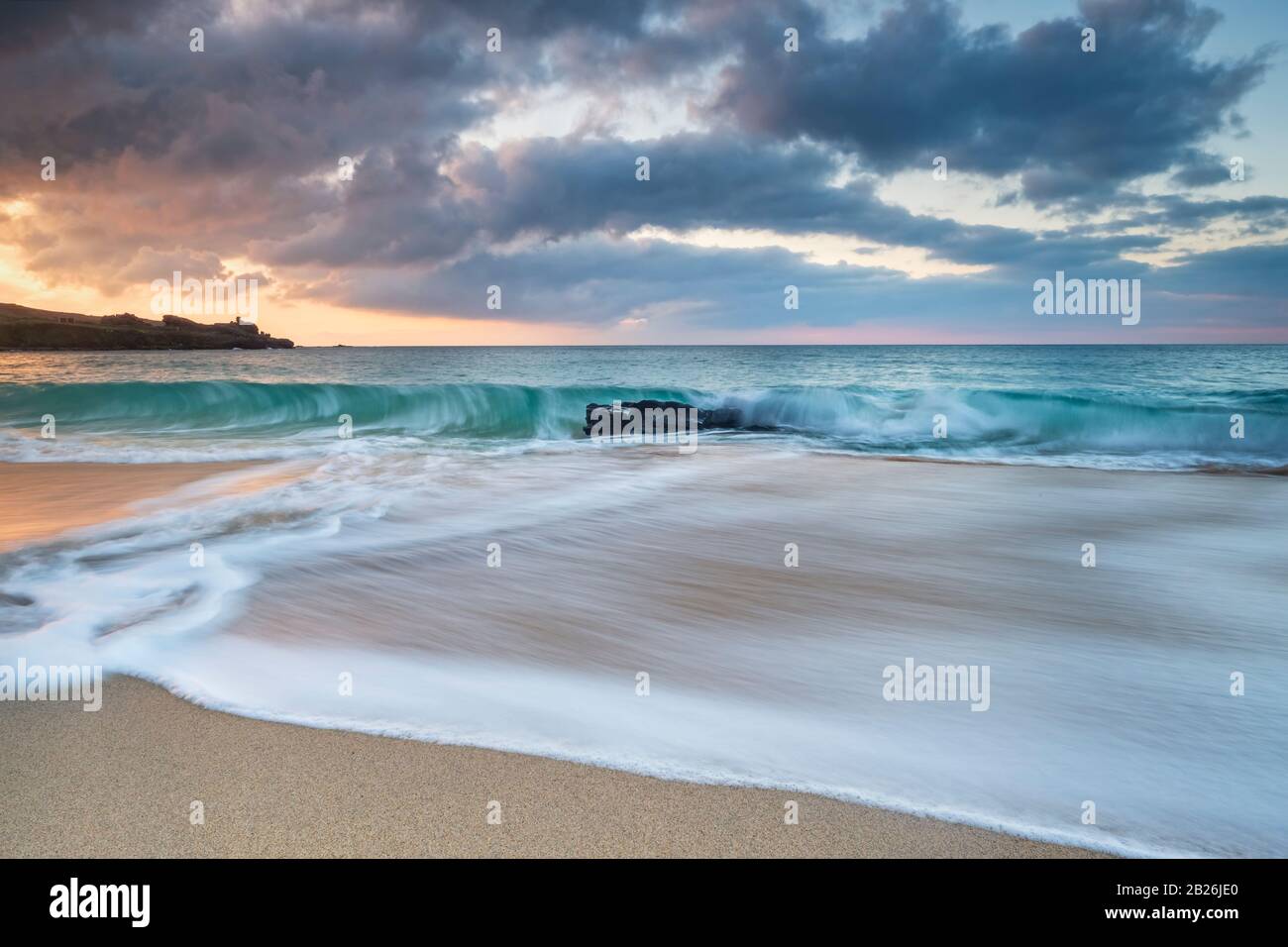 Porthmeor beach St Ives, Cornwall, surfing beach, artistic Cornwall, Cornwall colours, sea, sand, rocks, surfing, holiday destination, Uk travel, Stock Photo