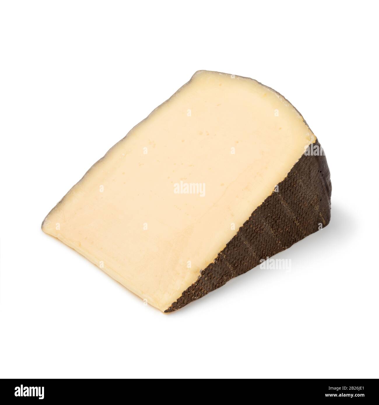 Wedge of Belgian Pere Joseph cheese isolated on white background Stock Photo