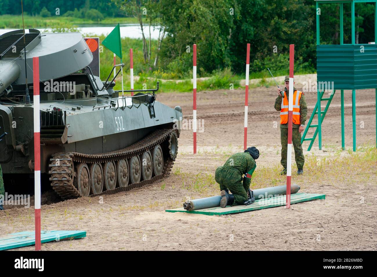 Crew of Meteorite UR-77 machine loads shells Stock Photo - Alamy