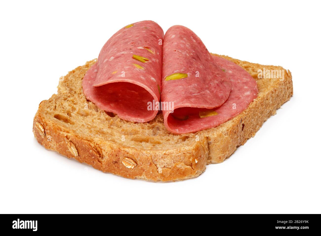 Salami slices and bread slice isolated on white background Stock Photo