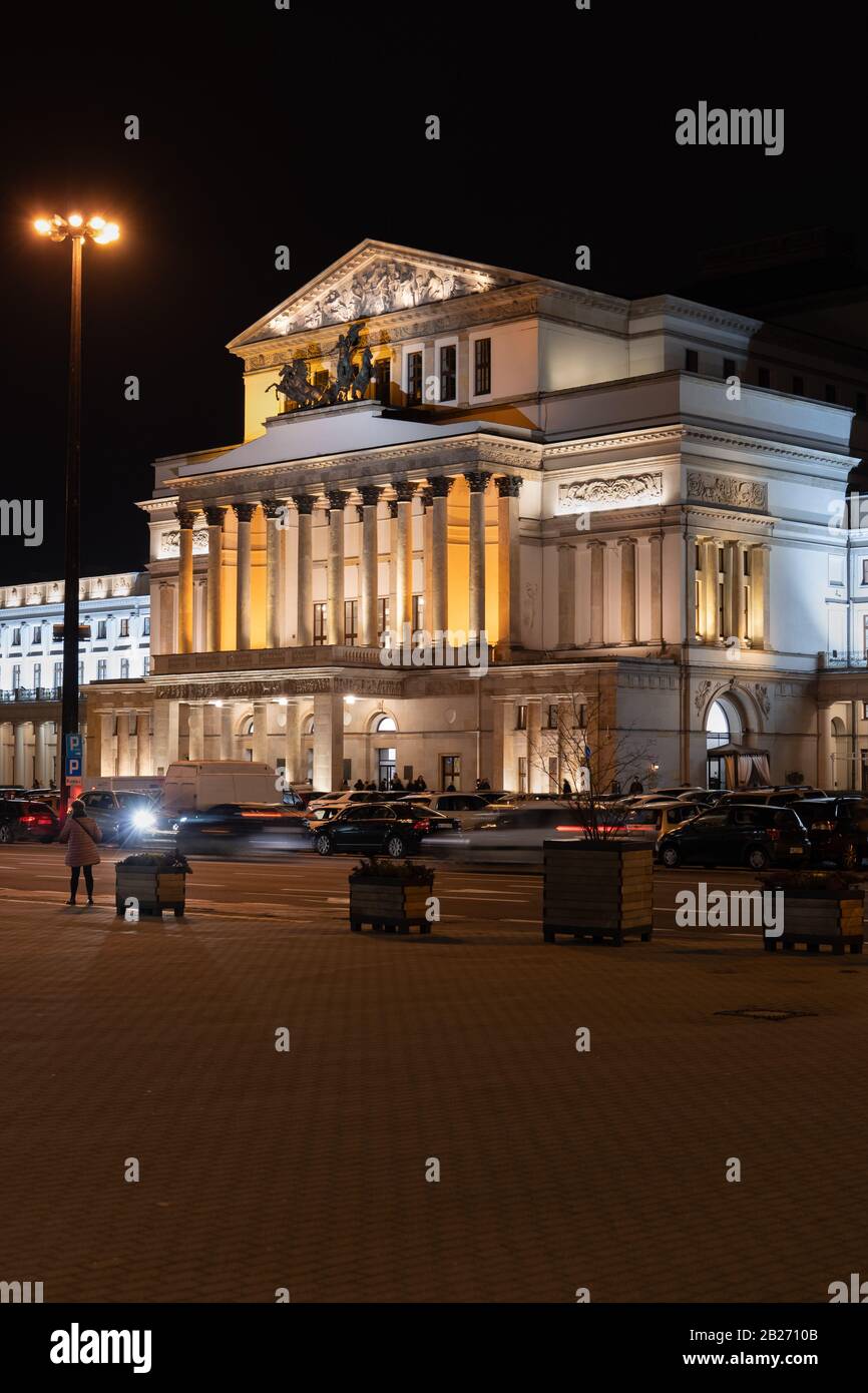 The Grand Theatre and National Opera (Polish: Teatr Wielki Opera Narodowa) illuminated at night in city of Warsaw in Poland Stock Photo