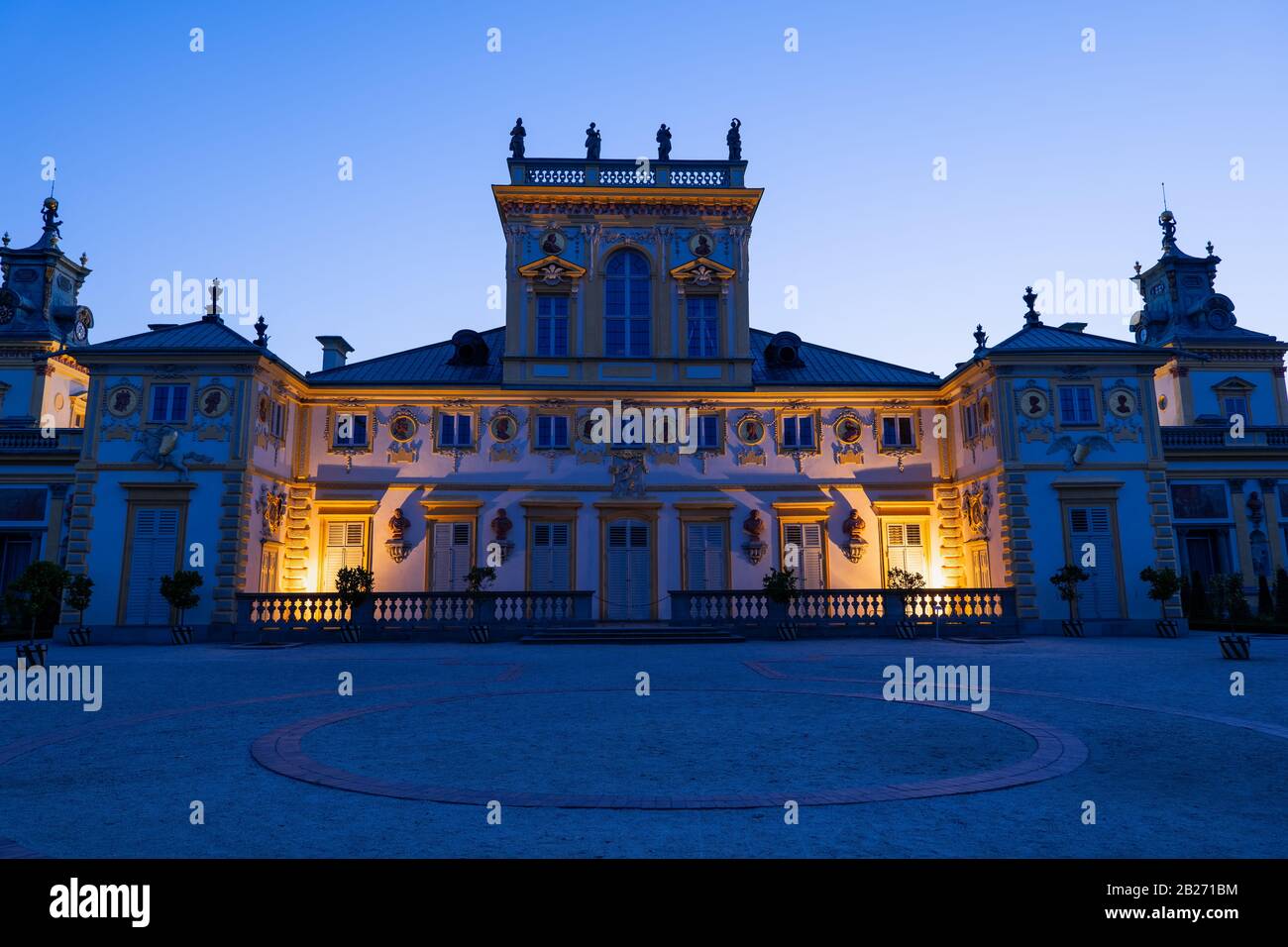 Wilanow Palace (Polish: Palac w Wilanowie) at dusk in city of Warsaw, Poland, east facade of Baroque royal residence of King John Sobieski III from 17 Stock Photo