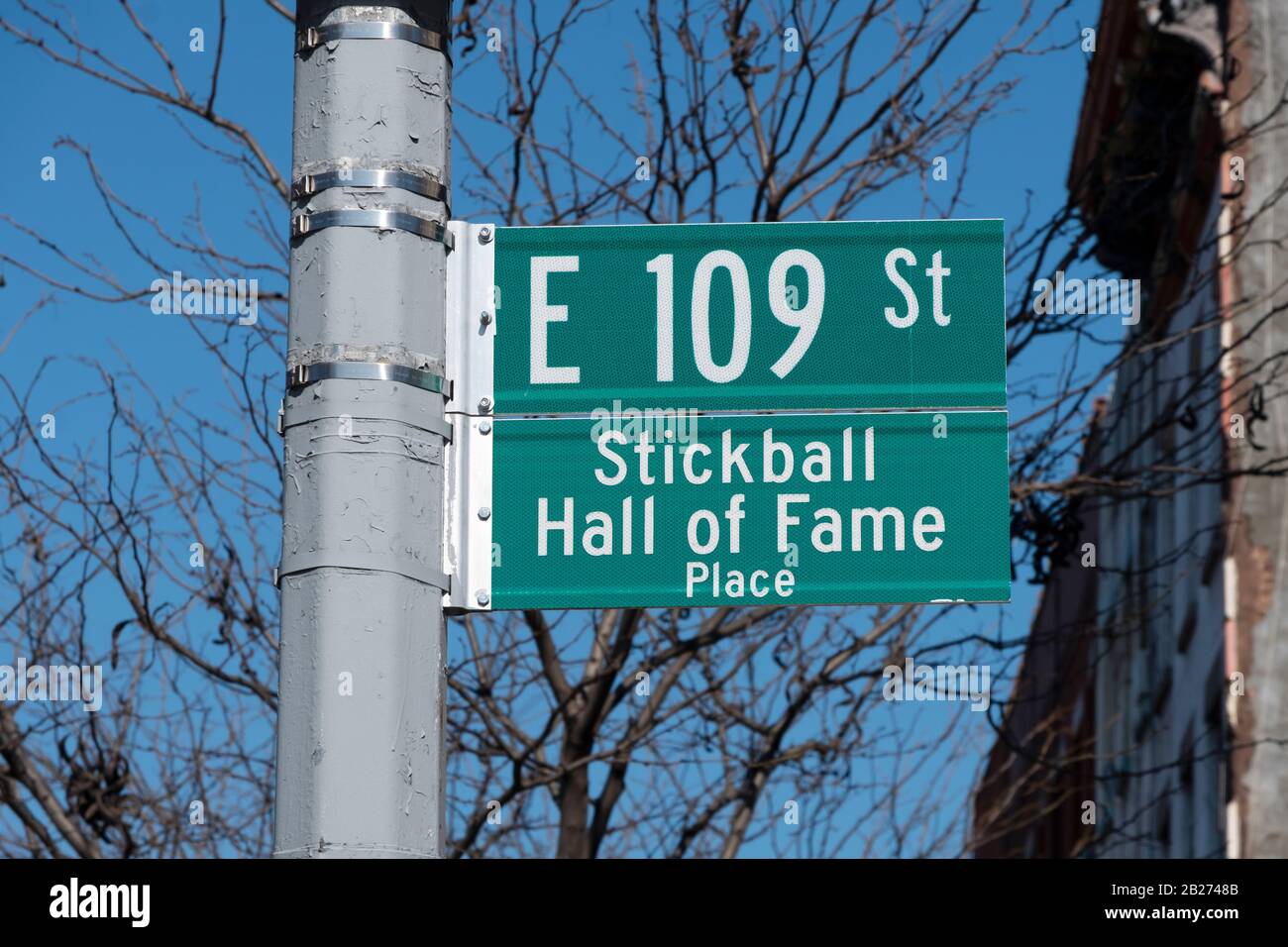 A sign on Third Avenue & East 109th Street proclaiming it the Stickball Hall of Fame Place. In Spanish Harlem in Manhattan. Stock Photo