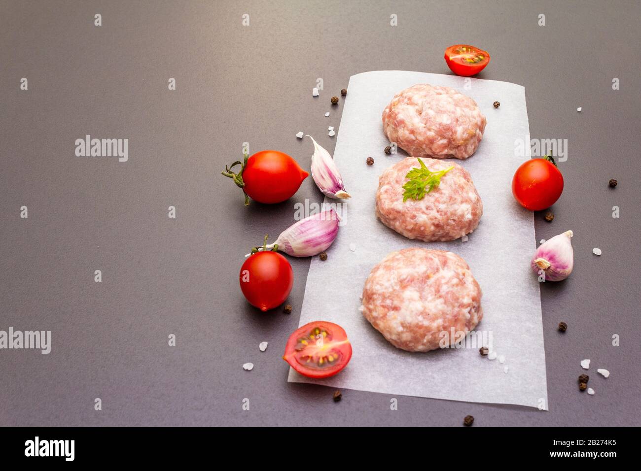 Raw fresh pork cutlets with spices and vegetables Healthy eating