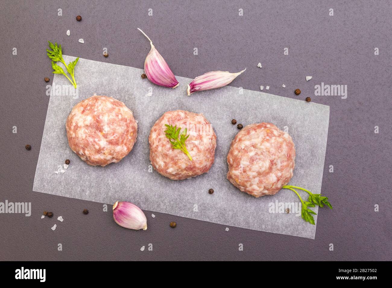 Raw fresh pork cutlets with spices and vegetables Healthy eating