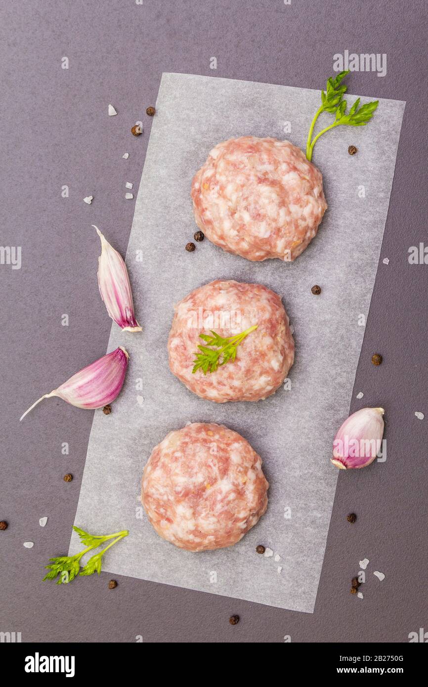 Raw fresh pork cutlets with spices and vegetables Healthy eating