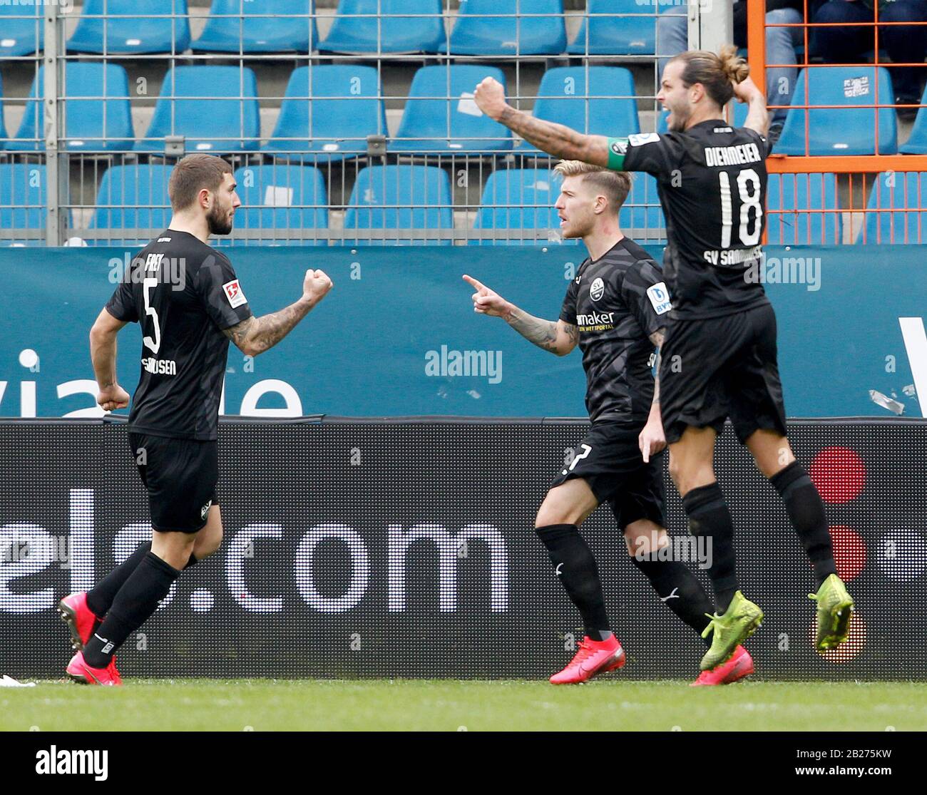 Bochum, Germany. 01st Mar, 2020. Football: 2nd Bundesliga, VfL Bochum - SV Sandhausen, 24th matchday at the Vonovia Ruhr Stadium. The Sandhausen scorer for 4:4 Philip Türpitz (2nd from left) cheers with Marlon Frey (left) and Dennis Diekmeier. Credit: Roland Weihrauch/dpa - IMPORTANT NOTE: In accordance with the regulations of the DFL Deutsche Fußball Liga and the DFB Deutscher Fußball-Bund, it is prohibited to exploit or have exploited in the stadium and/or from the game taken photographs in the form of sequence images and/or video-like photo series./dpa/Alamy Live News Stock Photo