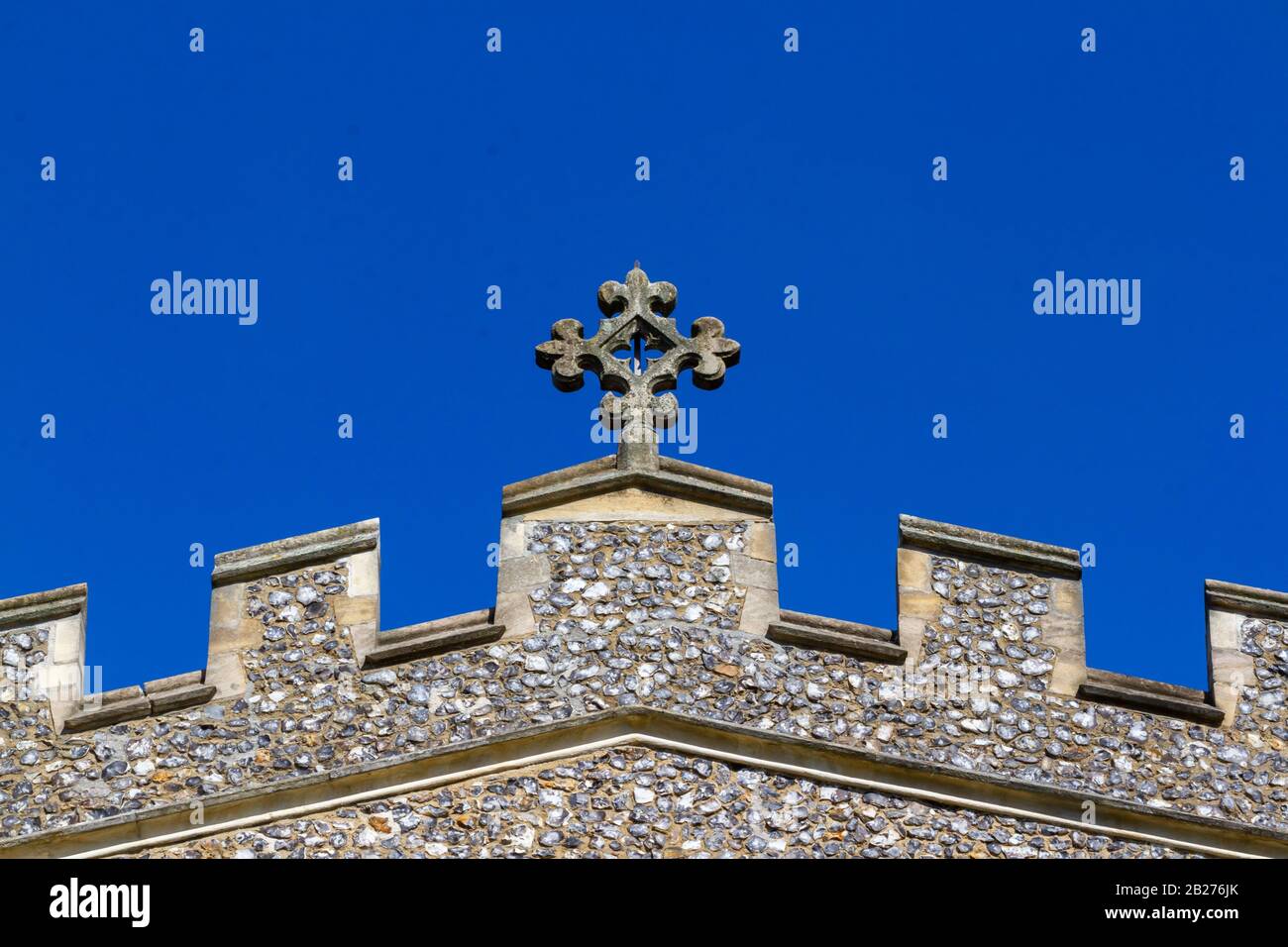 Rose Cross seen in front of blue sky on ST Marys Church in Ware, Hertfordshire, Stock Photo