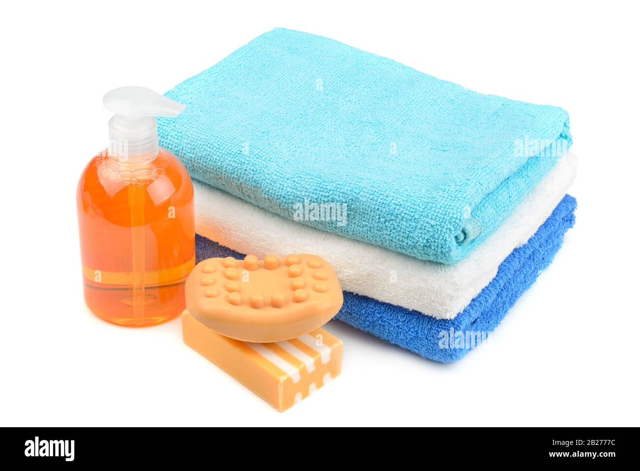 Towel, soap, shampoo isolated on white Stock Photo