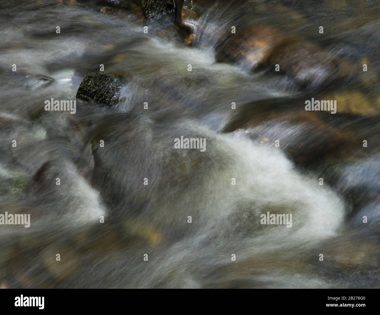 Waterfall and lush foliage in Glen Make on the West coast of The Isle of Man, UK Stock Photo