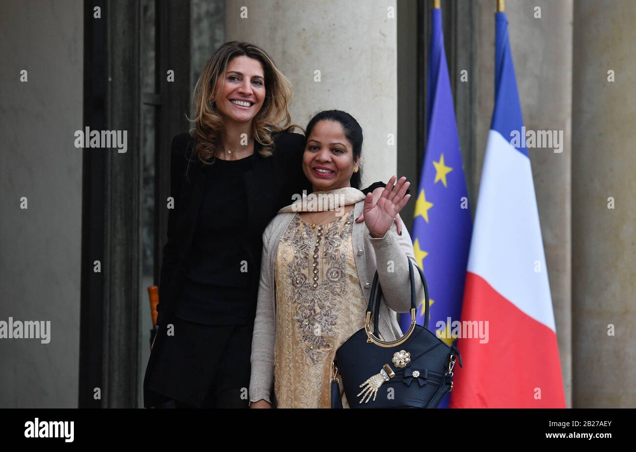 STRICTLY NO SALES TO FRENCH MEDIA OR PUBLISHERS - RIGHTS RESERVED  ***February 28, 2020 - Paris, France: Asia Bibi (R), a Pakistani Christian,  arrives with French journalist Anne-Isabelle Tollet at the