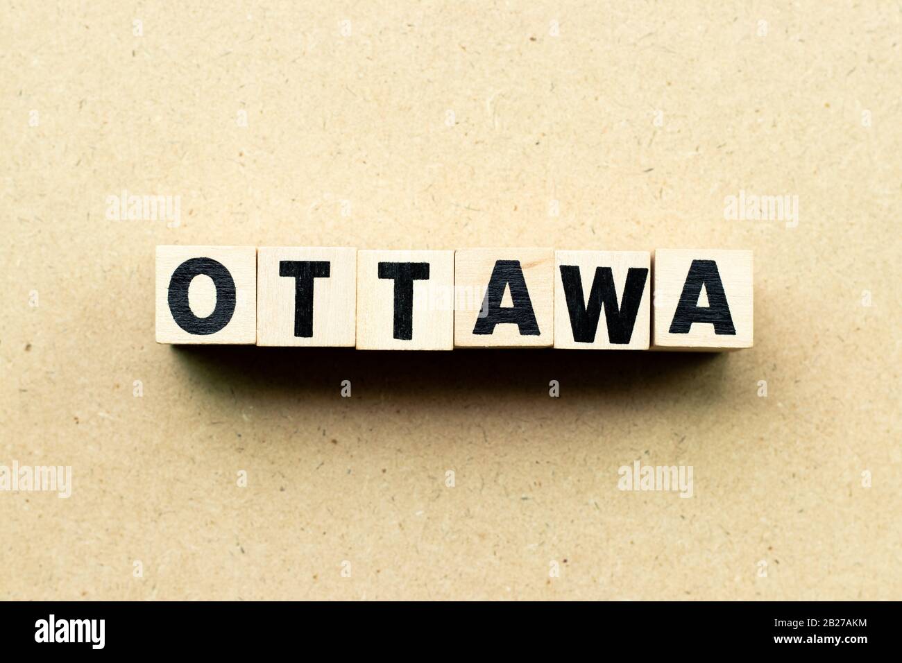 Letter block in word Ottawa on wood background Stock Photo - Alamy