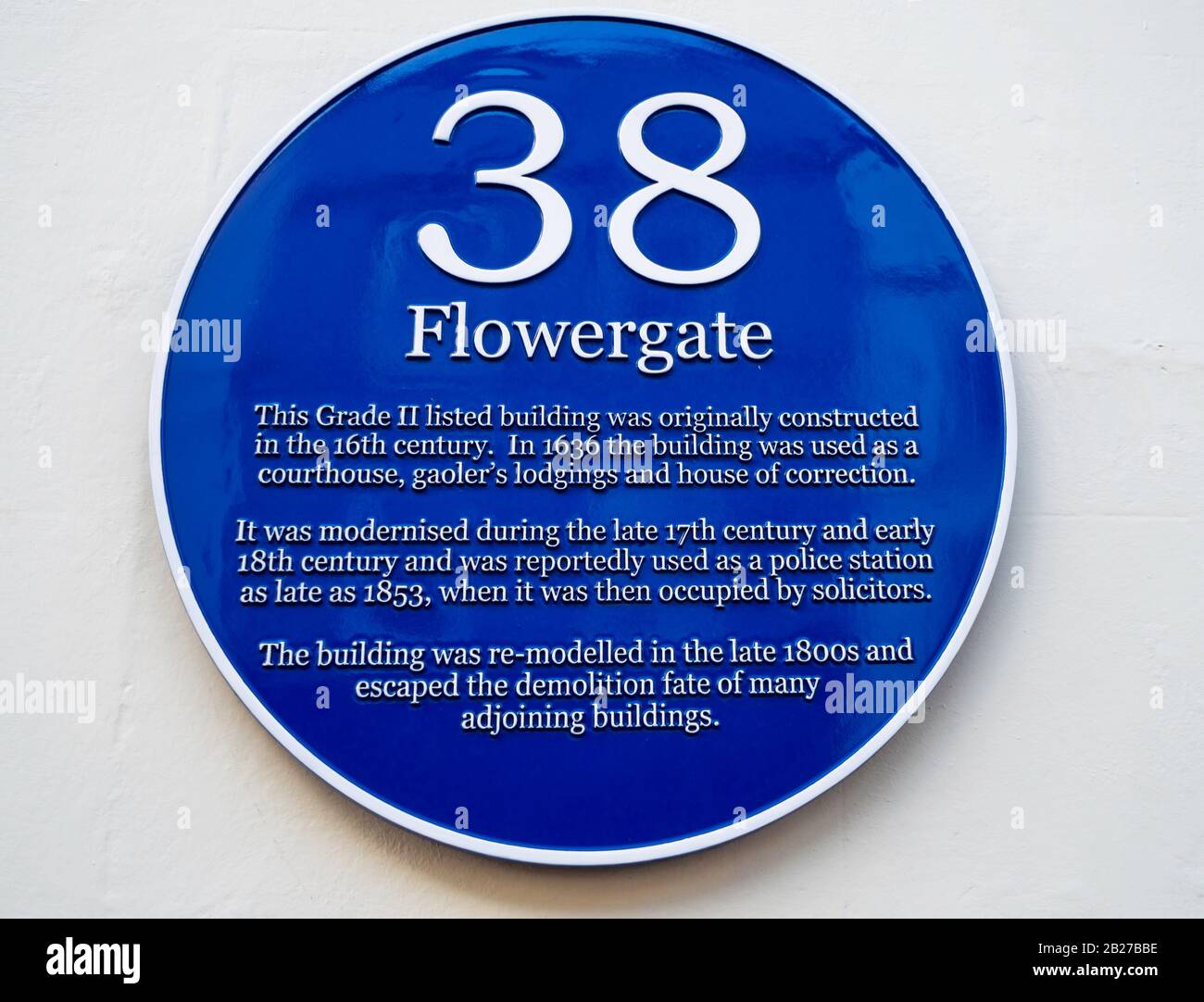 Blue Plaque No. 38 Flowergate recounting the history of the buildings usage since the 16th Century Stock Photo