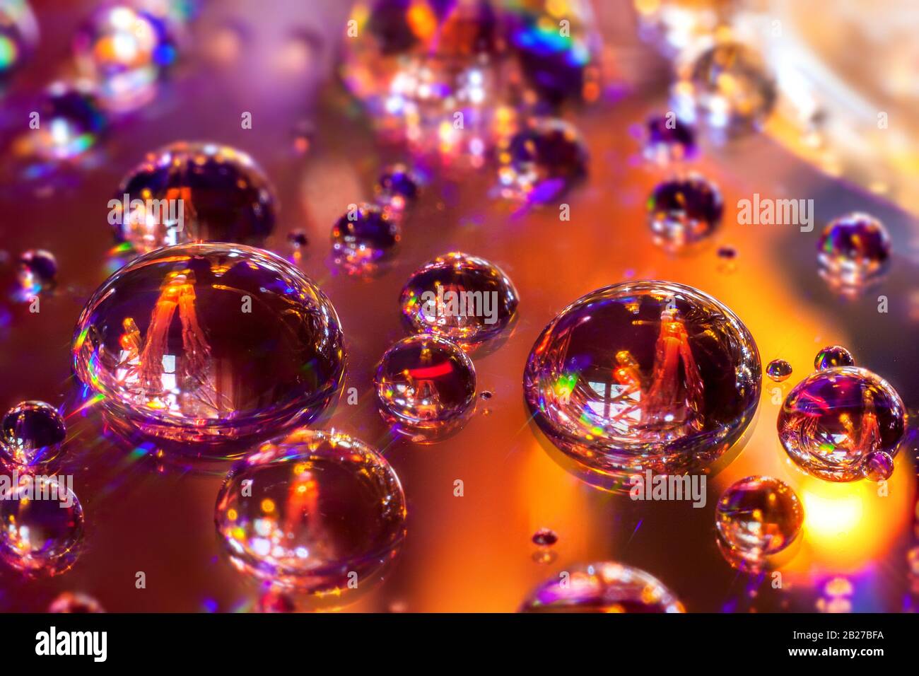 Reflection in drops of water.. Water drops full of color. Macro