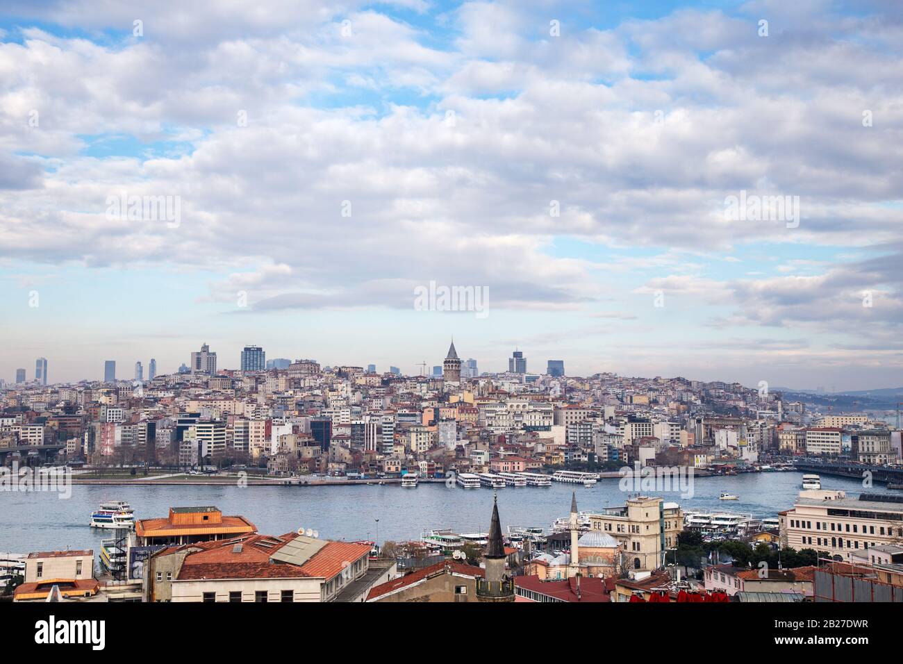 Istanbul / Turkey - 01/20/2019: View of Cityscape with Galata Tower and Golden Horn from garden of the Suleymaniye Mosque. Stock Photo