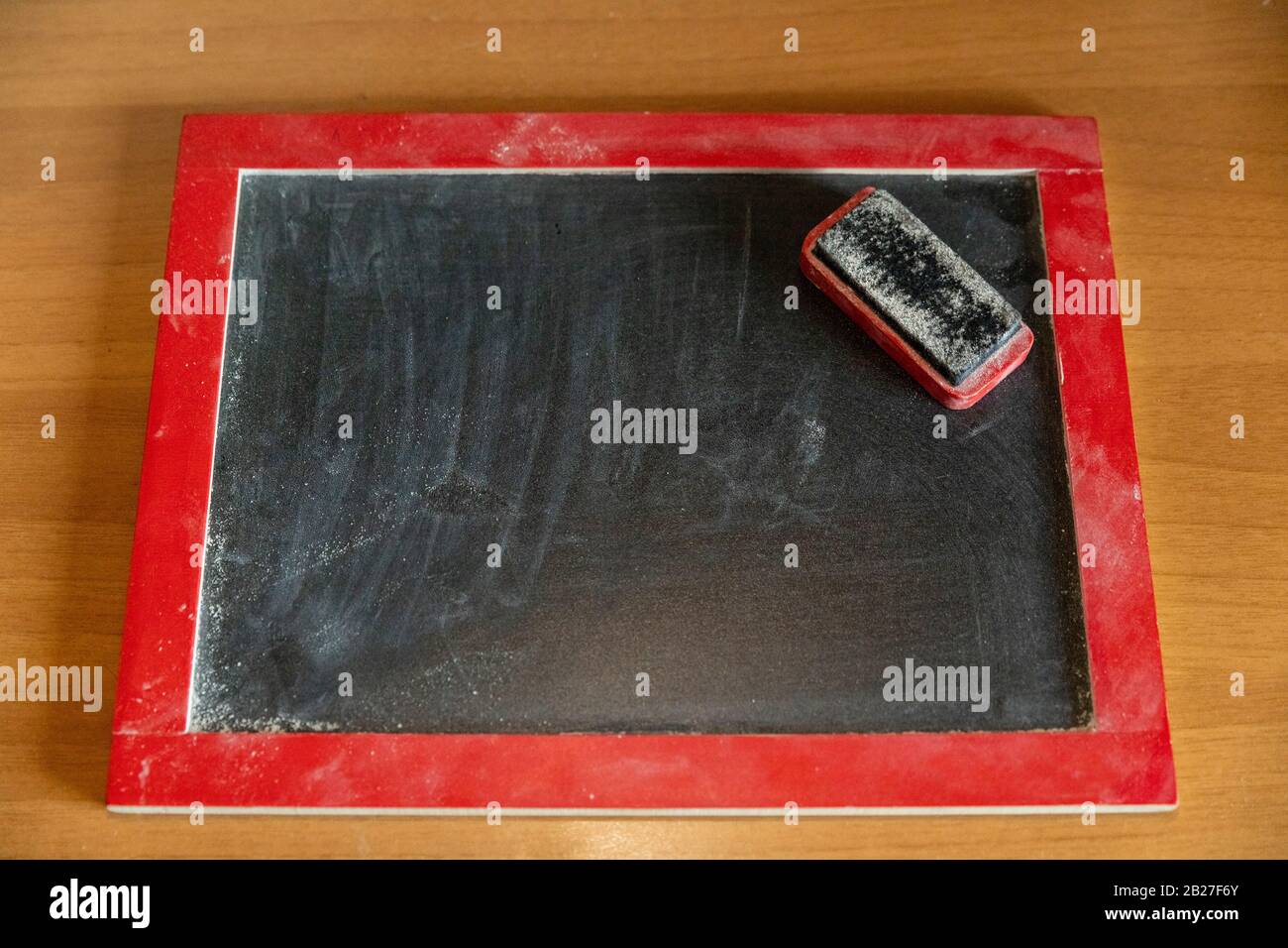 a blackboard for chalks and an eraser Stock Photo Alamy
