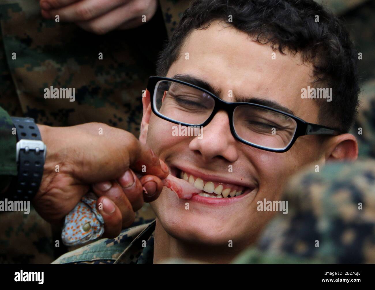Chanthaburi, Thailand. 1st Mar, 2020. US Marines eats a gecko during a jungle survival training as part of the military exercise Cobra Gold 2020 at a Navy base in Chanthaburi province. March 01, 2020. The 39th annual Cobra Gold military exercise is an event held between the Thai and US armed forces every year. It's the largest Asia-Pacific military exercise held each year, and is among the largest multinational military exercises in which the US participates. Credit: Urdee Image/ZUMA Wire/Alamy Live News Stock Photo
