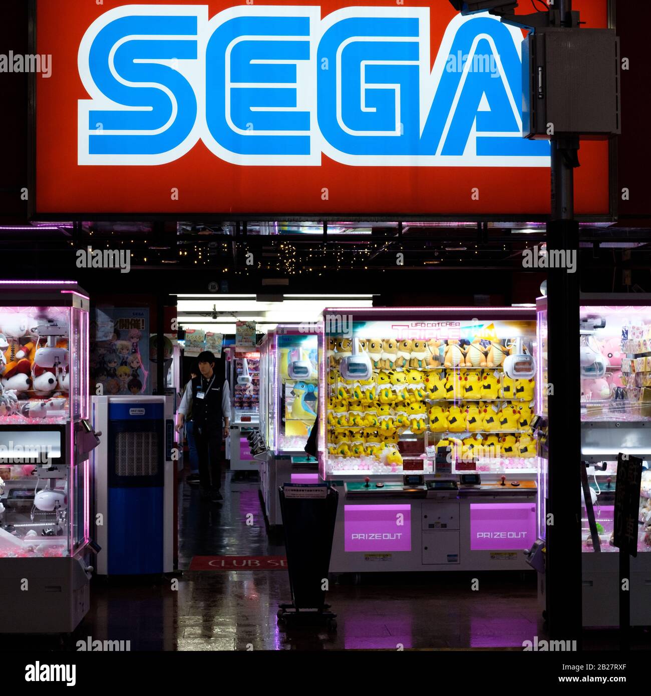 Signage at a Sega gaming arcade on a rainy night in Shinjuku, Tokyo, Japan. Stock Photo