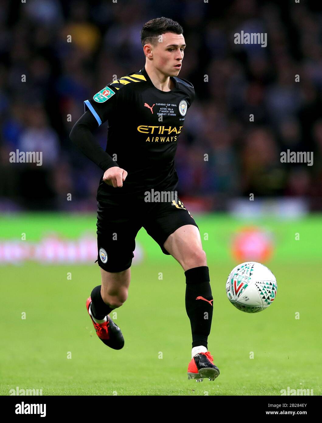 Manchester City's Phil Foden in action during the Carabao Cup Final at Wembley Stadium, London. Stock Photo