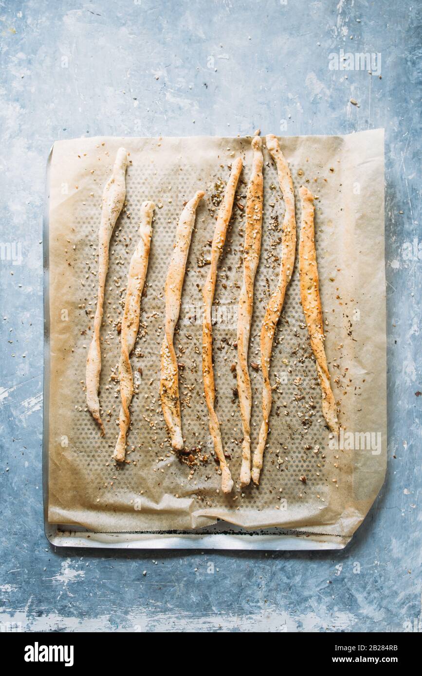 Preparing crunchy breadstick step by step visual guide, breadsticks ready to be eaten,on a