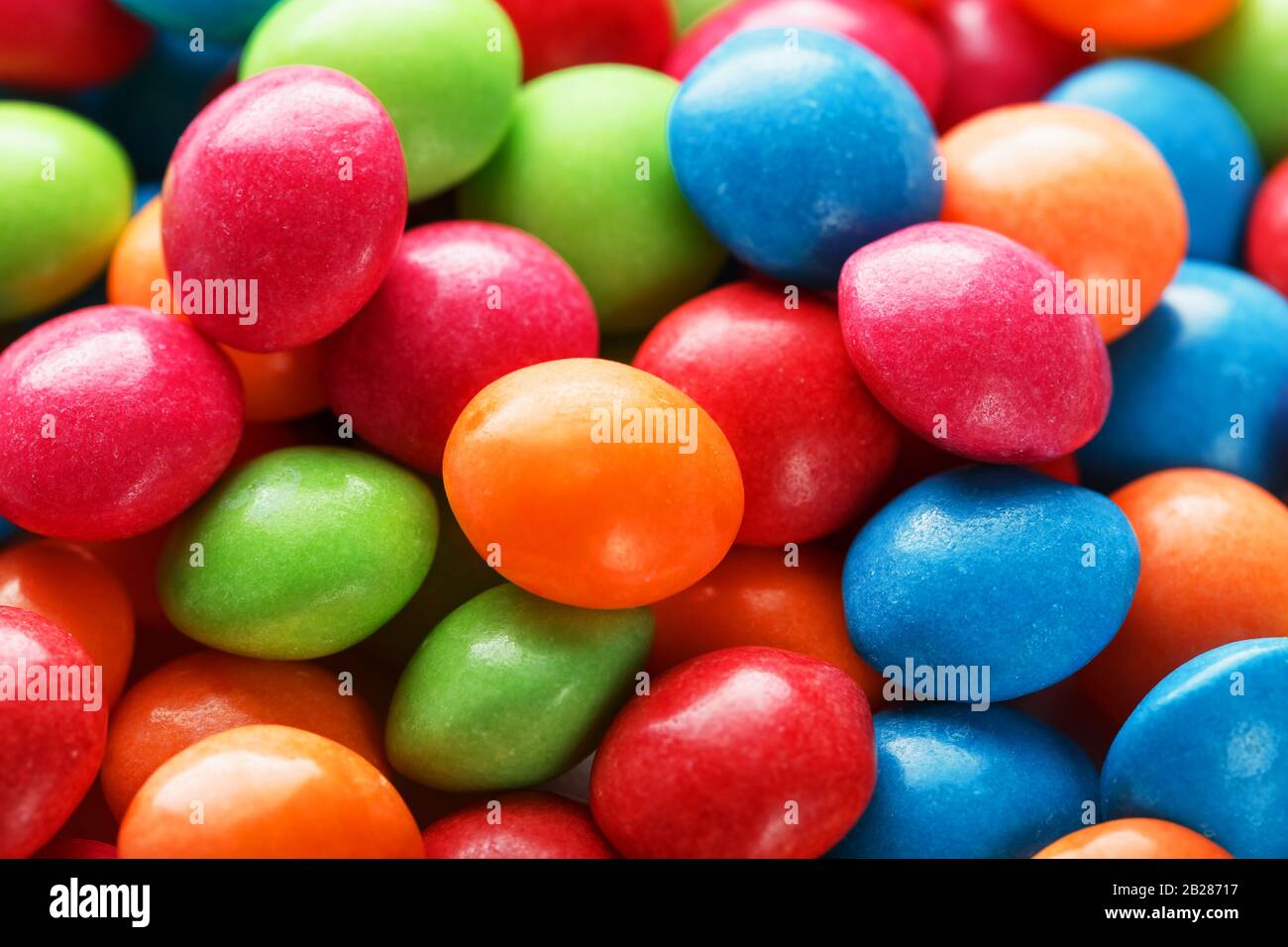 Rainbow colors of multicolored candies close-up, texture and repetition of dragee Stock Photo ...
