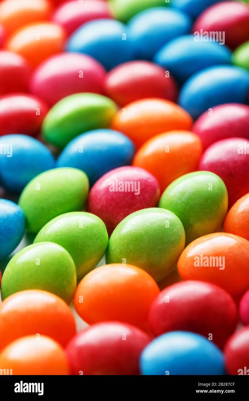 Rainbow colors of multicolored candies close-up, texture and repetition of dragee Stock Photo ...