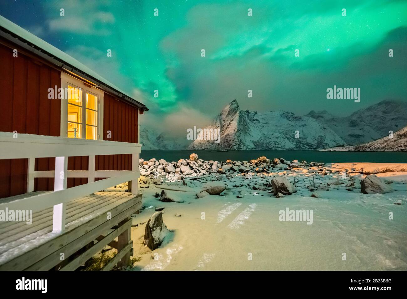 View of Rorbuer during northern lights, Hamnoy, Moskenes, Moskenesoya, Nordland, Lofoten, Norway, Northern Europe Stock Photo