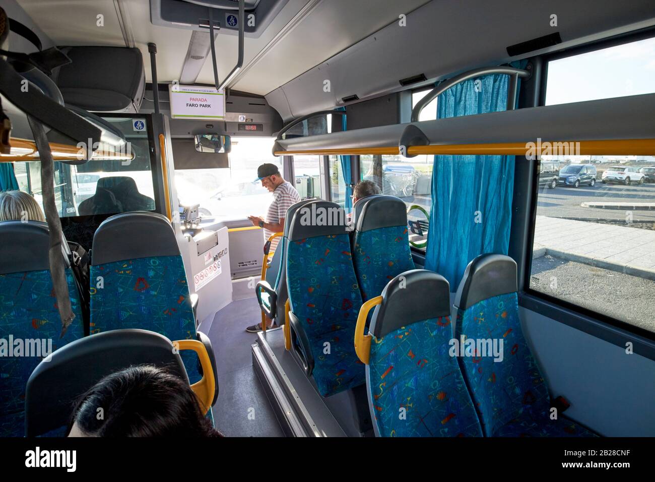 passengers boarding local loop bus service in playa blanca Lanzarote canary islands spain Stock Photo